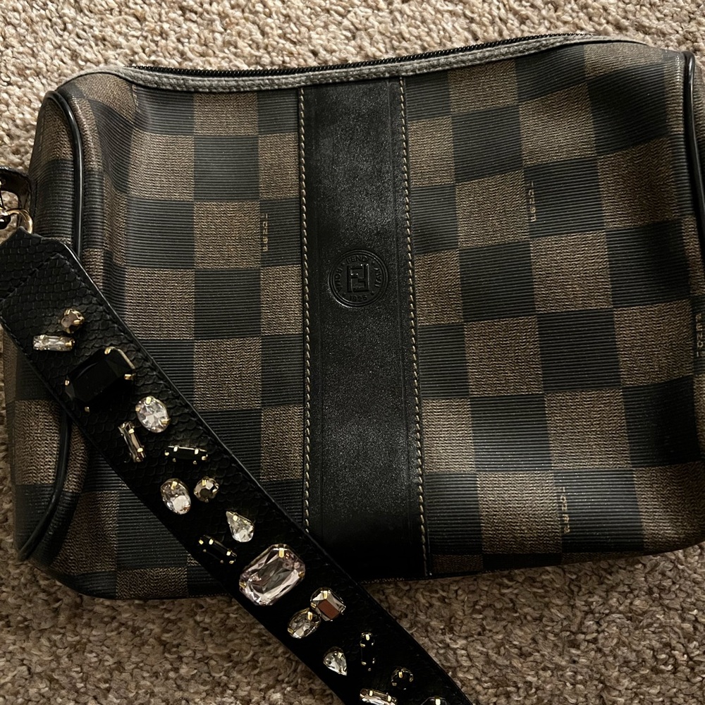 Fendi vintage purse- strap was added to bag. Strap is not Fendi.